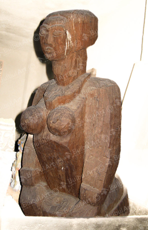 Unfinished Carving of a Woman